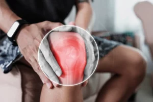 Man suffering from knee pain, closeup.